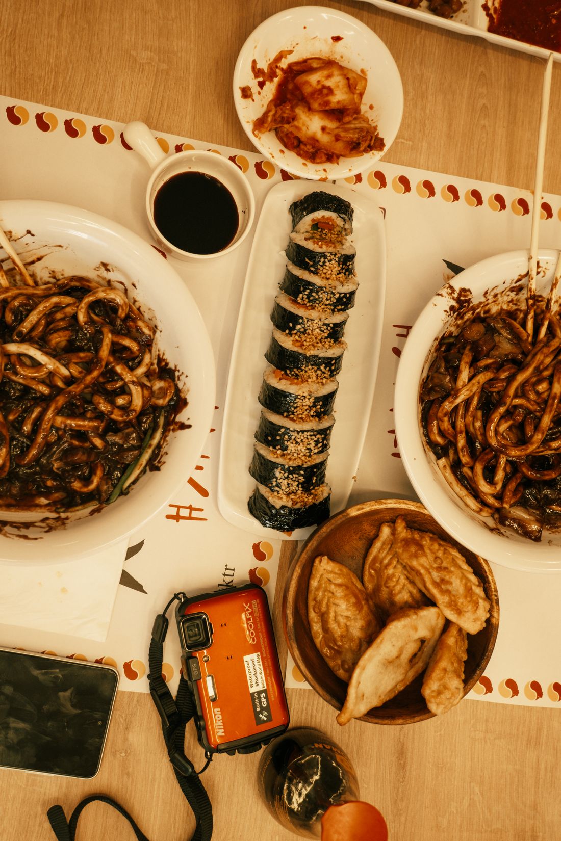 Black bean noodles with kimchi and dumplings