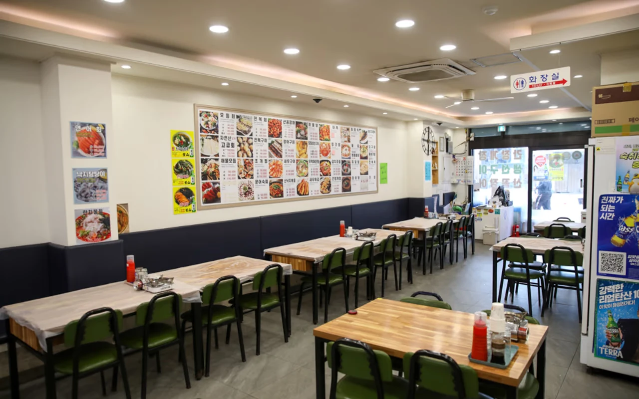 Sujeong Hoejib's first-floor dining room with wall menu; photograph date unknown.